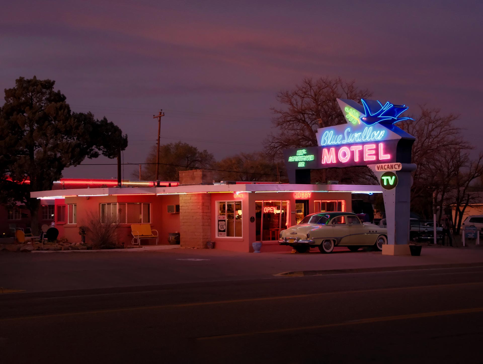 The Blue Swallow Motel in Tucumcari, New Mexico, with its neon lit after dark